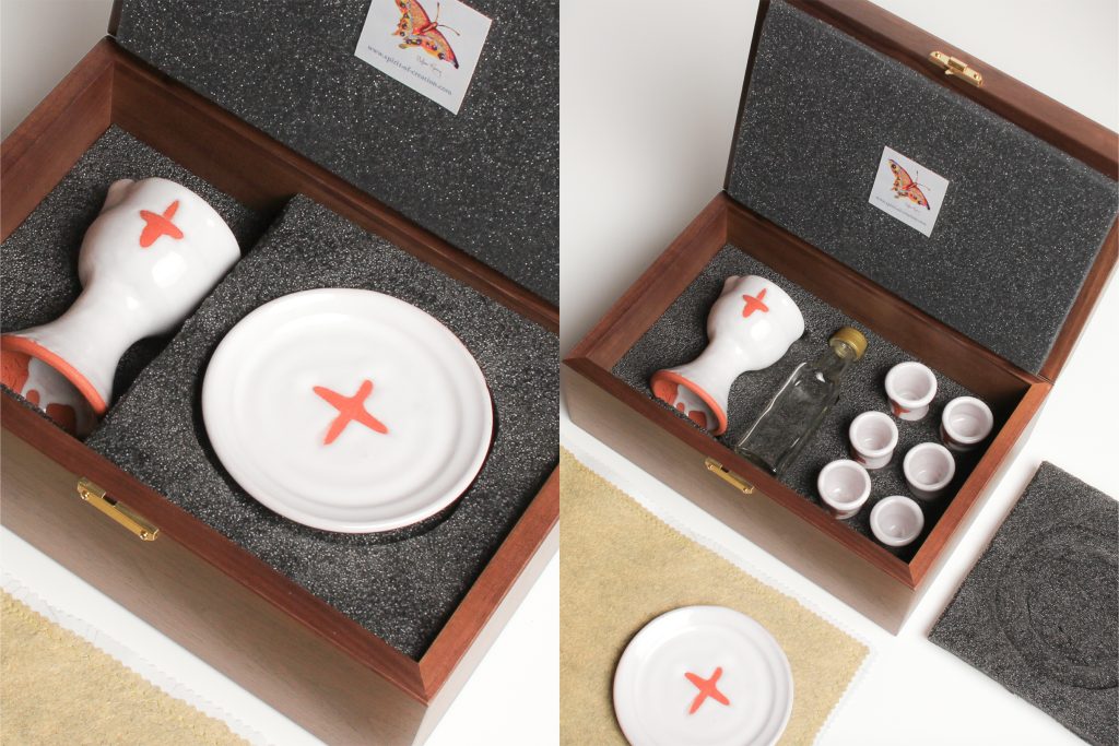 Walnut box (made in USA), custom made to fit the set, with hard foam on the inside bottom of the box, which is carved to hold the set. Soft foam lines the lid and supports the plate to cushion the ceramics for travel.