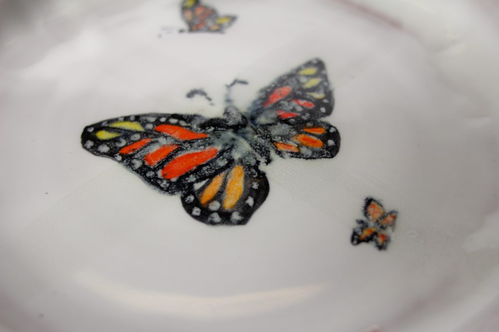 Butterflies--called 'flying flowers' in Chinese--are symbols of new life. From caterpillar to cocoon and then the metamorphosis to flight, we are challenged to take risks, to have faith that there is beauty and life beyond what we can see at this moment. There is a saying 'To be able to become a butterfly, you need to be willing to give up being a caterpillar.'